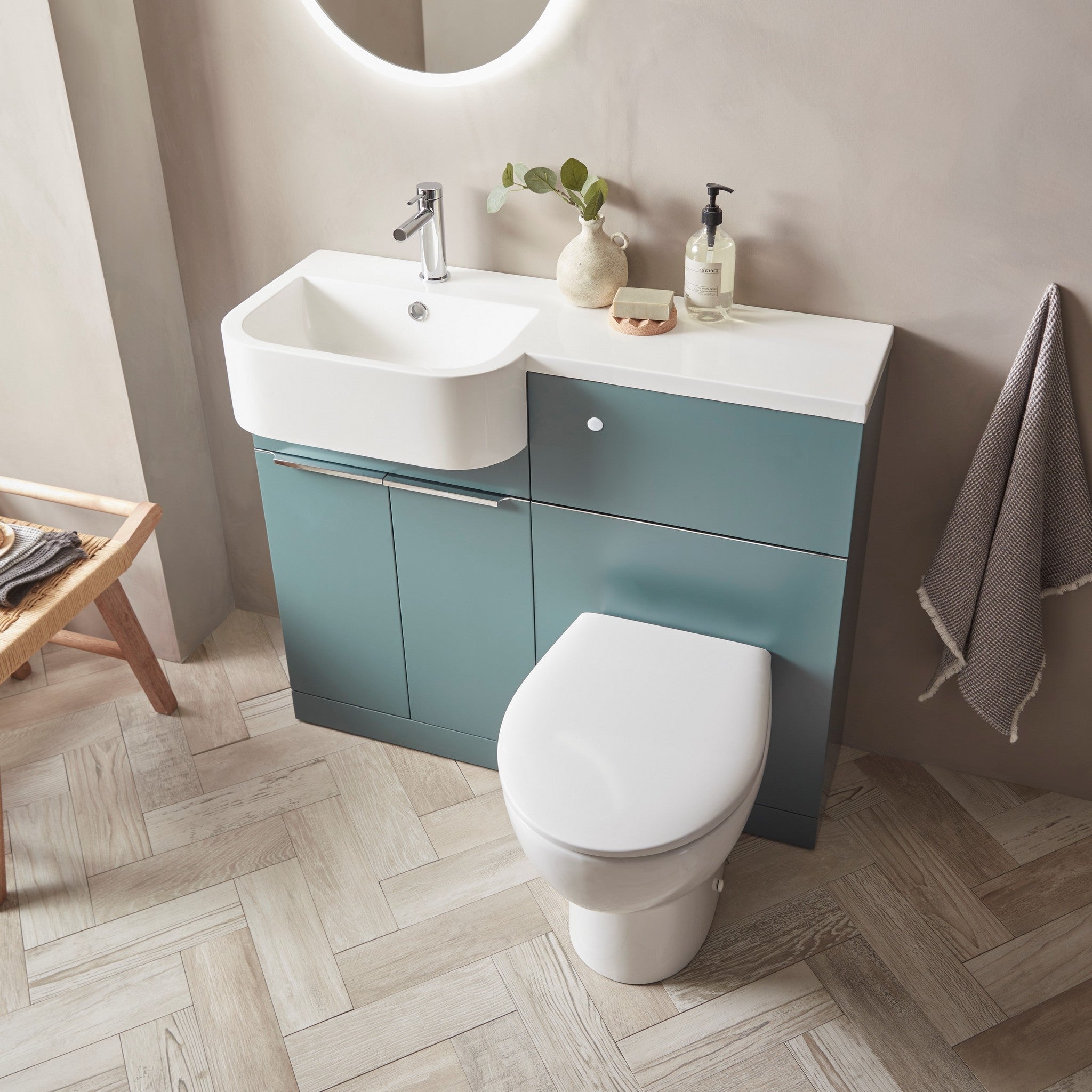 Tavistock Match 1200mm Combination Unit - Viridian Green (L or R Hand) against pal painted wall underneath a light up mirror MAT12LVRG