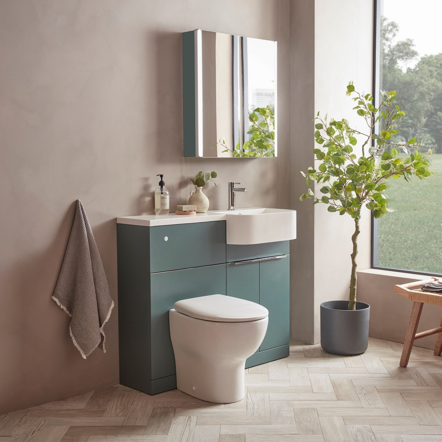 Tavistock Match 1000mm Combination Unit - Viridian Green (L or R Hand) against smooth pal wall underneath light up mirror MATRVRG