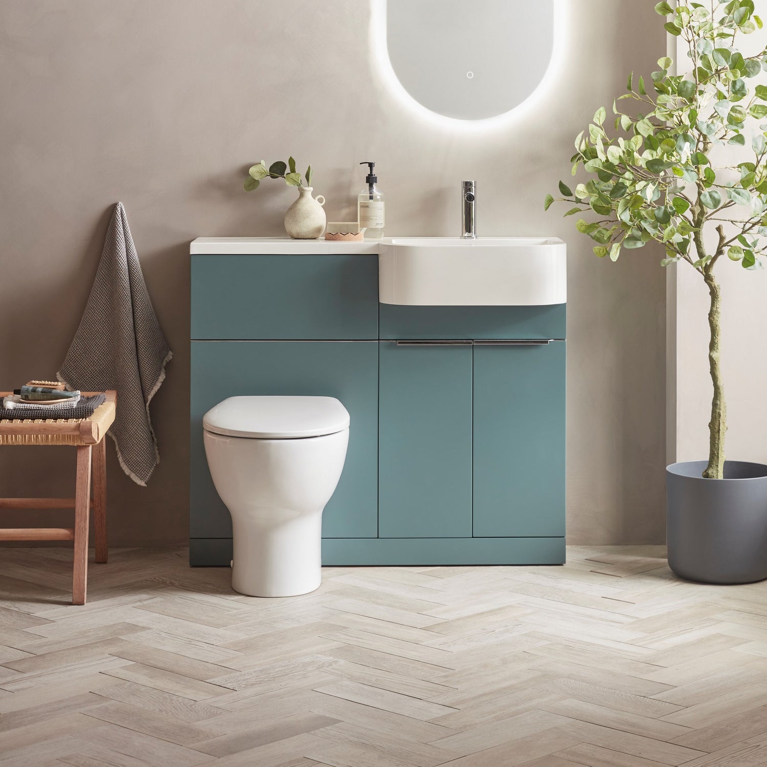 Tavistock Match 1000mm Combination Unit - Viridian Green (L or R Hand) against smooth pal wall underneath light up mirror MATRVRG