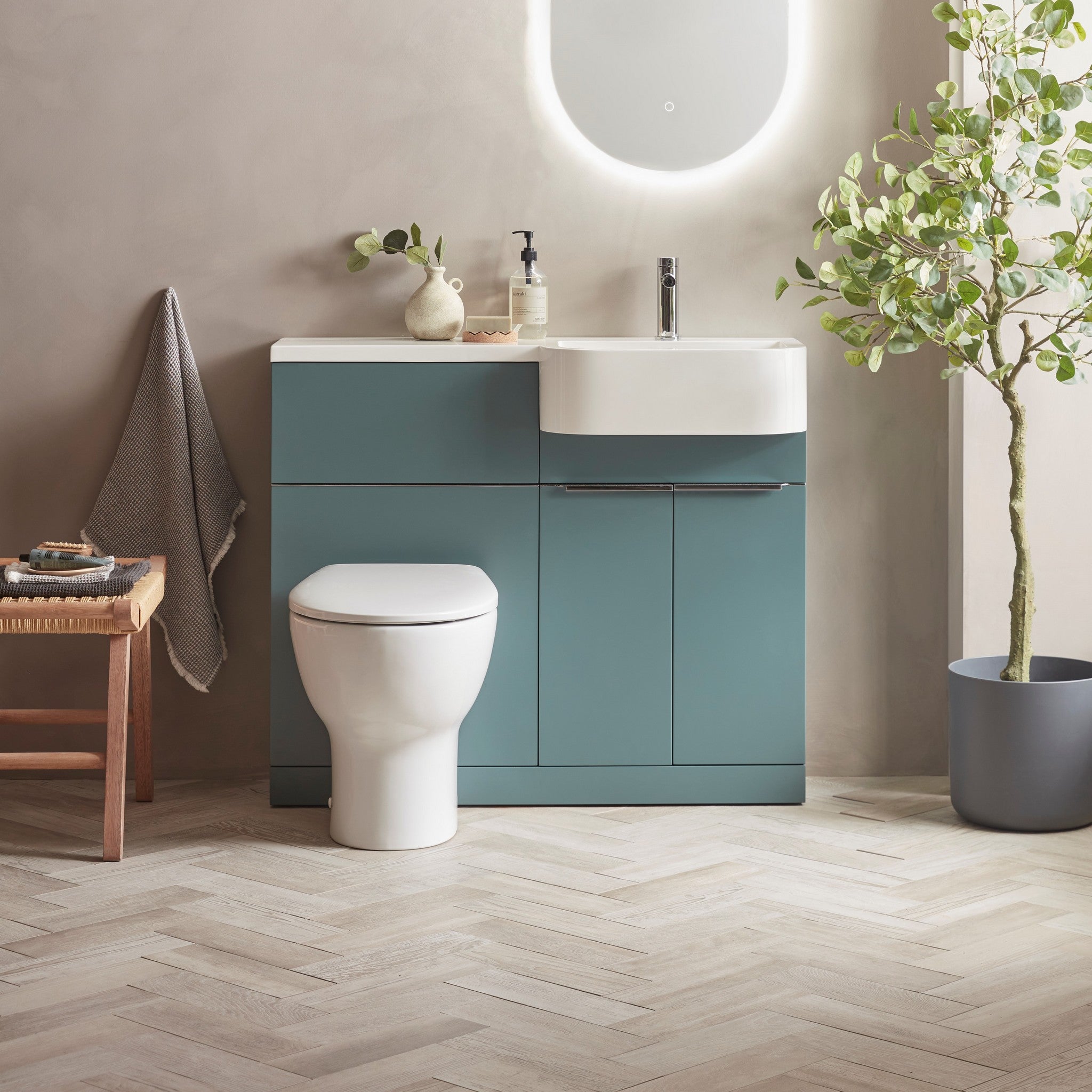 Tavistock Match 1000mm Combination Unit - Viridian Green (L or R Hand) against smooth pal wall underneath light up mirror MATRVRG