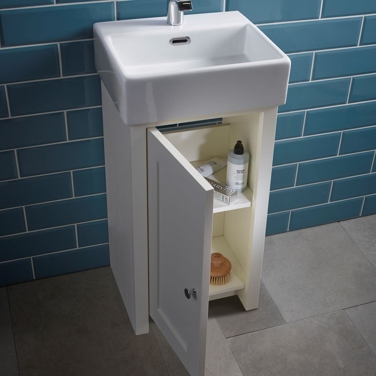 Tavistock Lansdown Cloakroom 430mm Freestanding Unit & Basin - Various Colours opened unit door against light blue tiled wall LAN400C.LW
