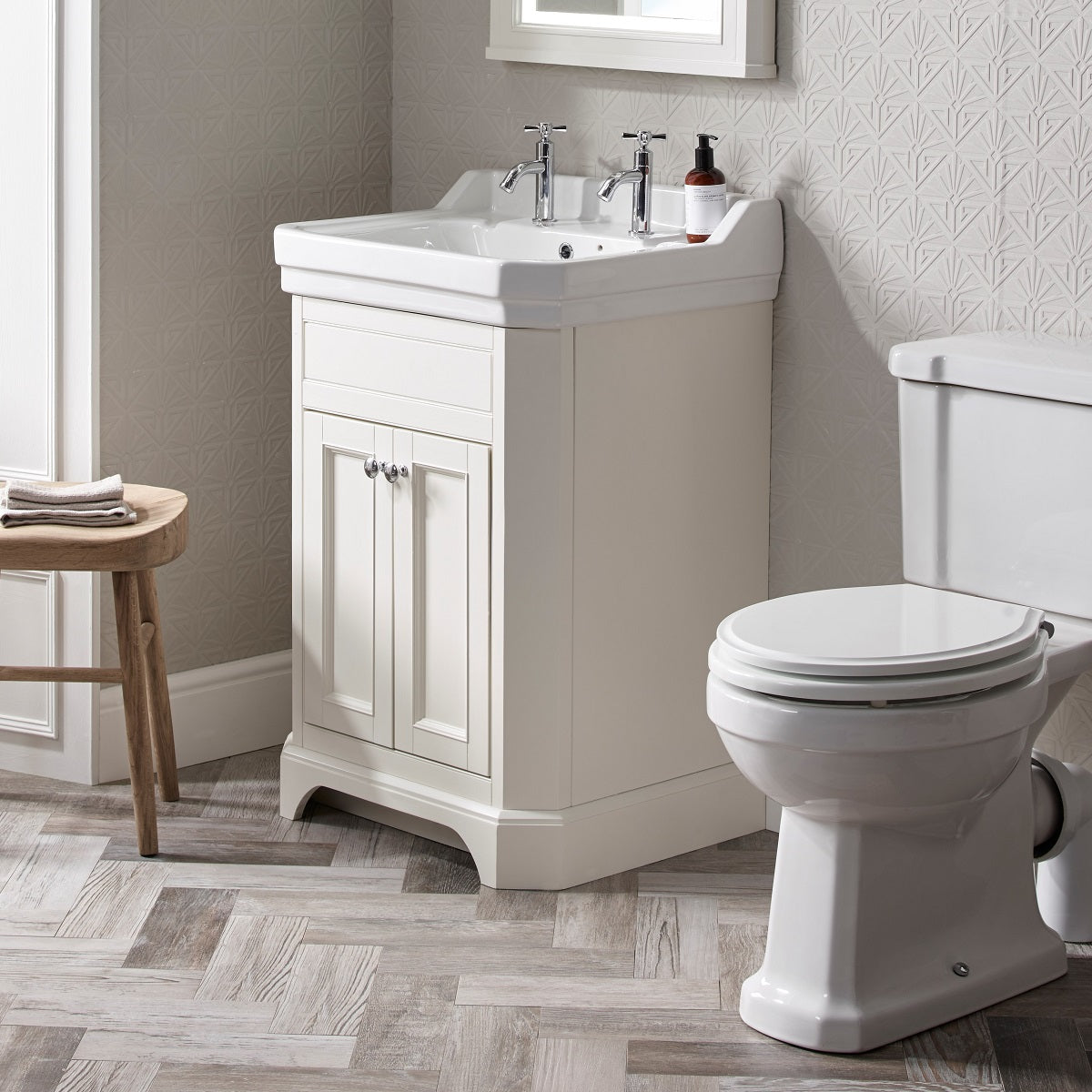 Tavistock Vitoria 600mm Floor-reaching Unit & Basin -Various Colours against white wallpaper design underneath a white mirror VT60FLW