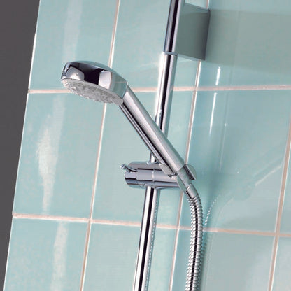 Aqualisa Aspire Mixer Shower with green wall tiles ASP001CA