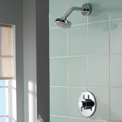 Aqualisa Aspire Mixer Shower with green wall tiles ASP001CF