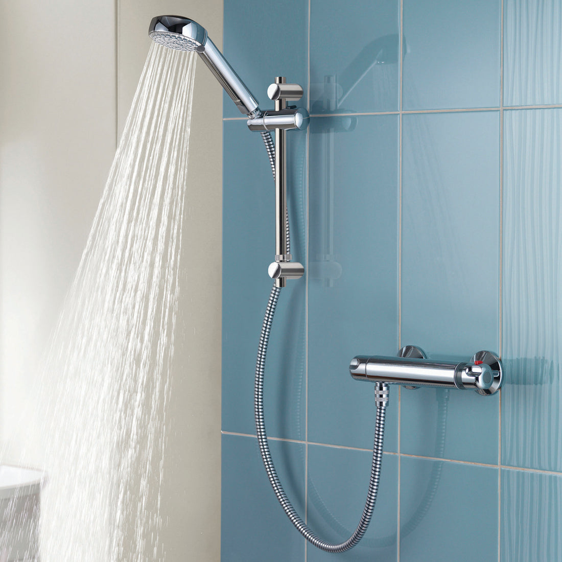 Aqualisa Midas 100 Bar Shower - Exposed With Adjustable Head against light blue tiling MD100BAR