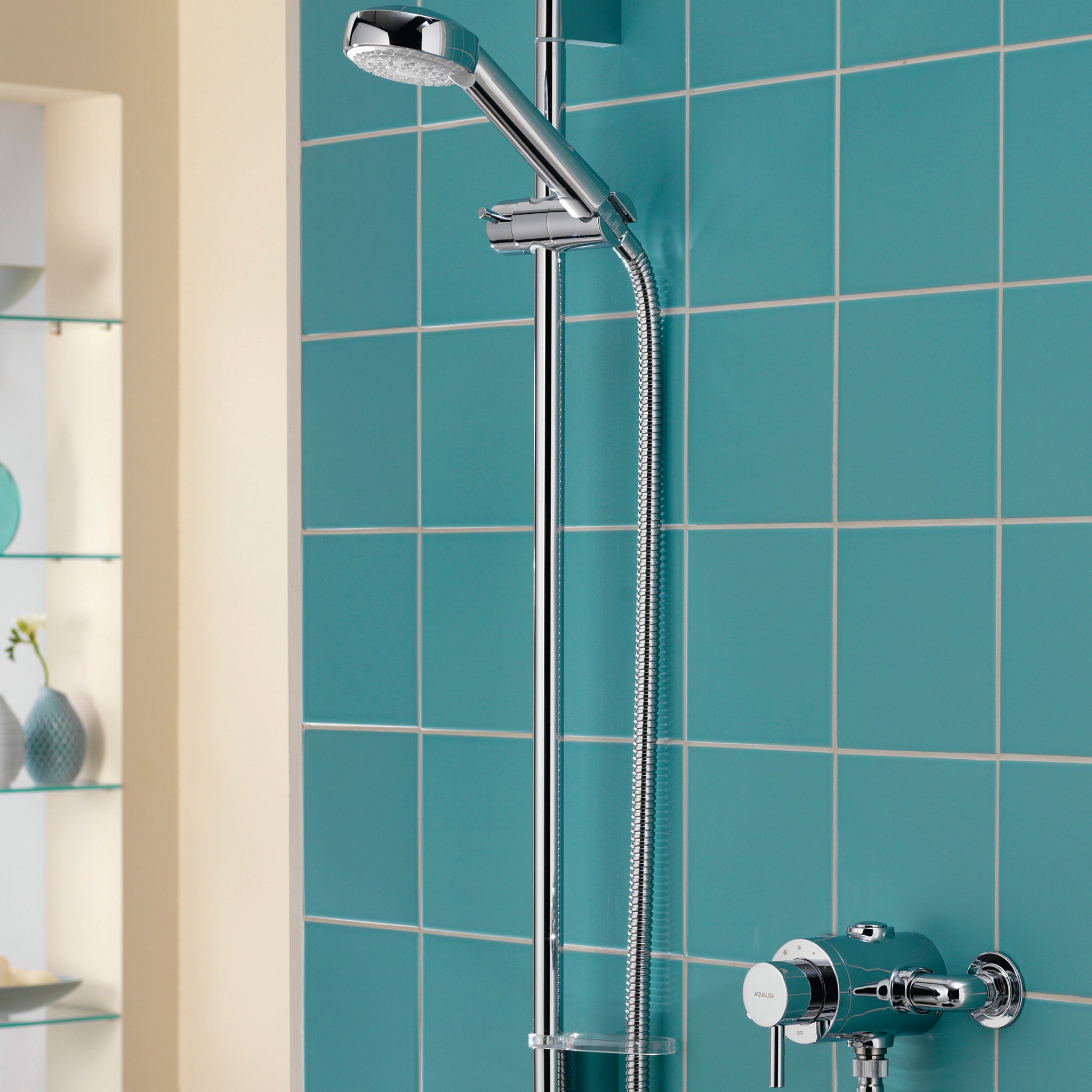 Aqualisa Siren Shower - Exposed With Adjustable Head against light blue wall SRN001EA