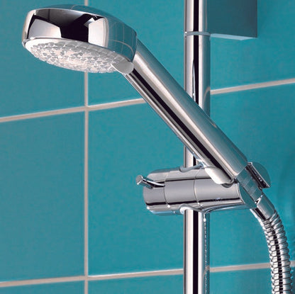 Aqualisa Siren Shower - Exposed With Adjustable Head against light blue wall SRN001EA