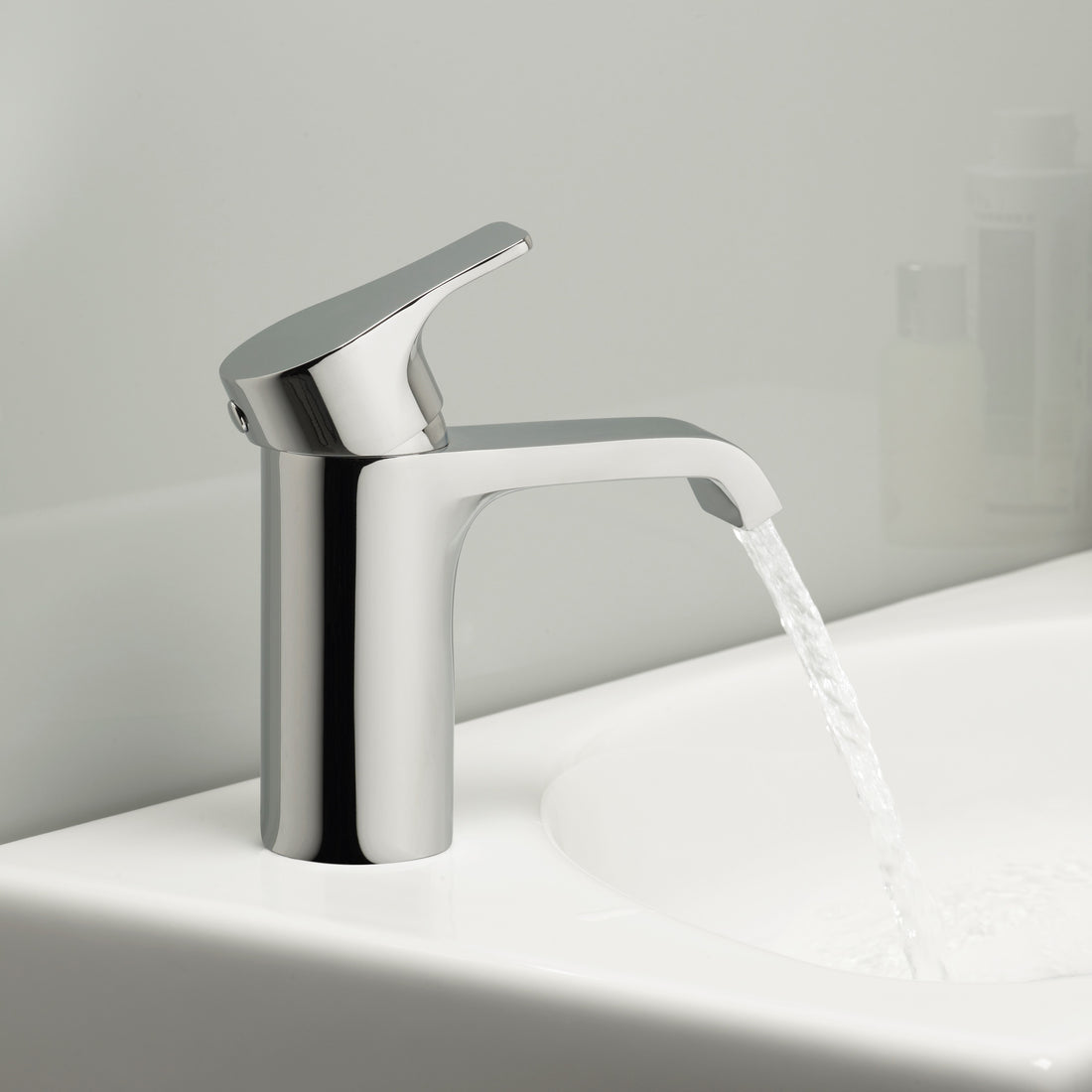 Tavistock Blaze Basin Mixer With Click Waste - Chrome  in front of white wall TBL11