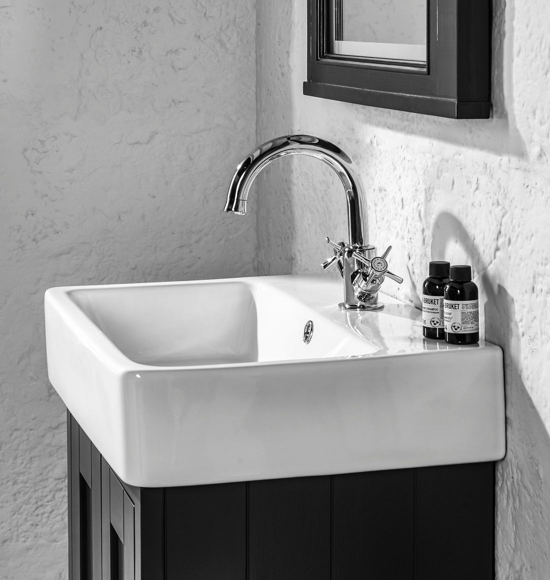 Tavistock Cheltenham Basin Mixer With Click Waste - Chrome underneath black mirror TCM11