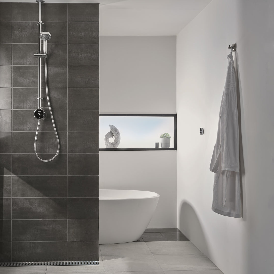 Aqualisa Quartz Touch Smart Shower - Exposed Adjustable Head With Bath Overflow Filler against grey tiling QZST.A1.EV.DVBTX.20