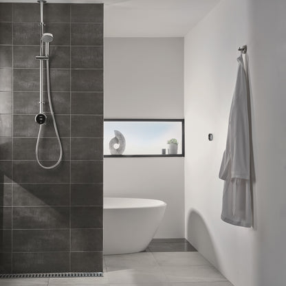 Aqualisa Quartz Touch Smart Shower - Exposed Adjustable Head With Bath Overflow Filler against grey tiling QZST.A1.EV.DVBTX.20