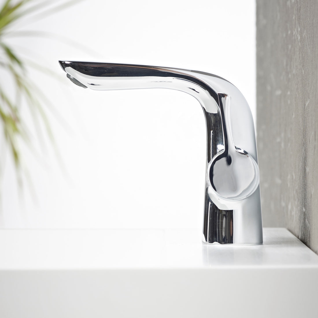 Tavistock Revive Basin Mixer With Click Waste - Chrome close up view blurred background TRV11
