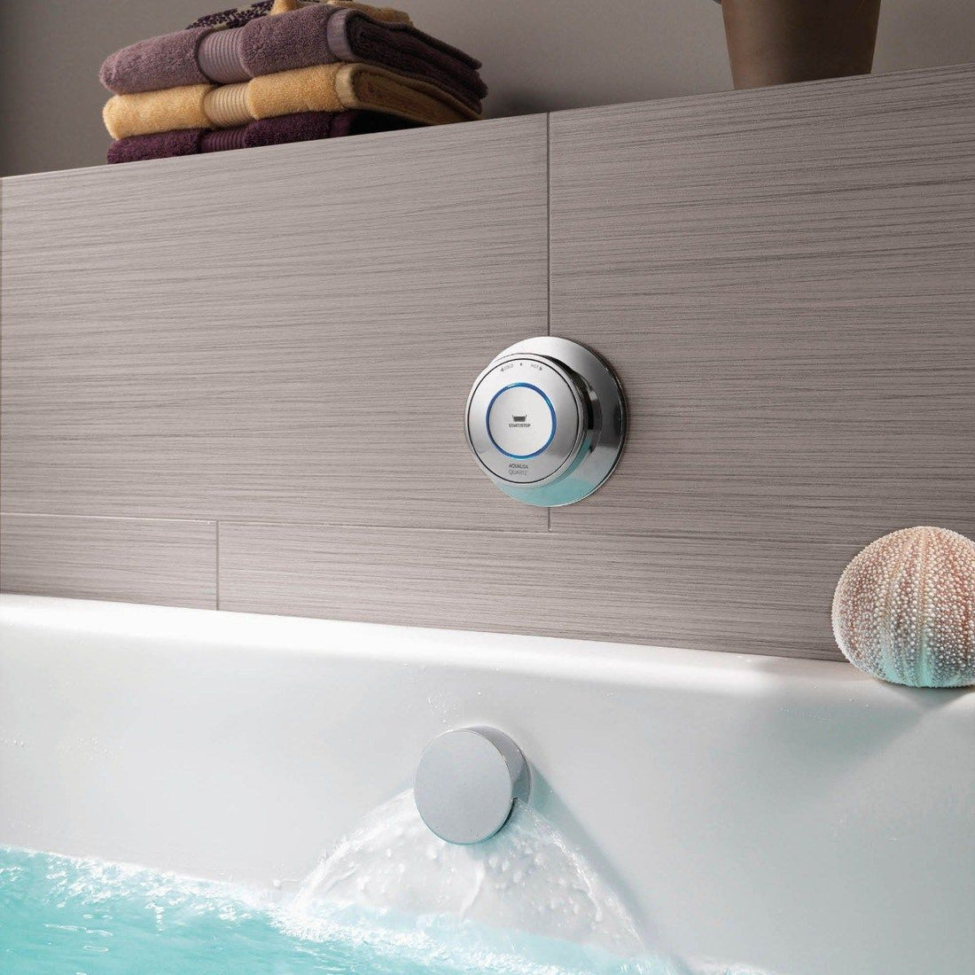 Aqualisa Quartz Classic Smart Bath Overflow Filler against wooden wall paneling QZD.A1.BTX.20