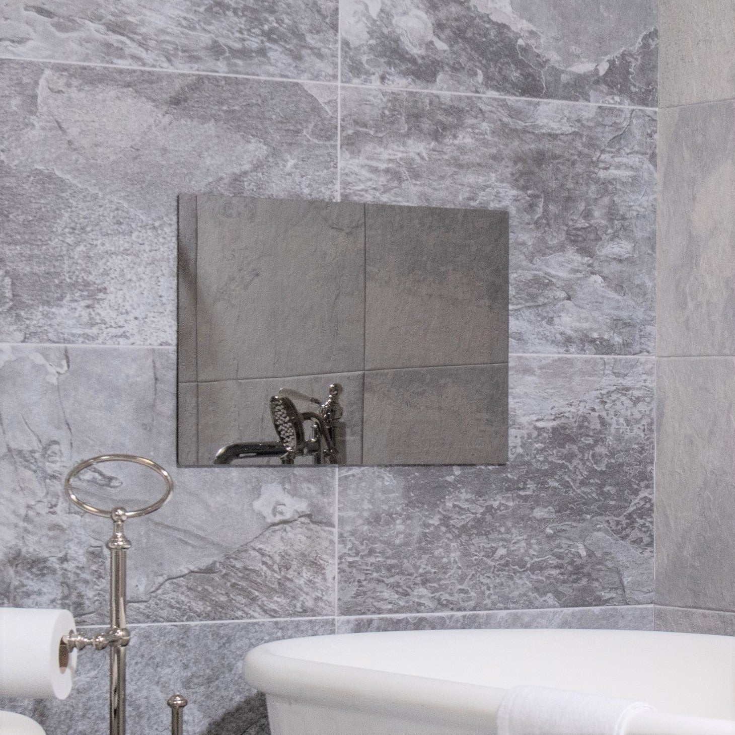 ProofVision 32inch Premium Bathroom Smart TV against light grey tiles above bathtub PV32MF-A