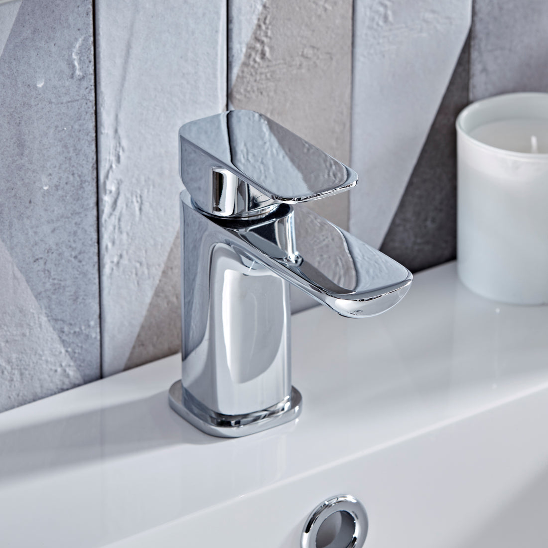 Tavistock Haze Mini Basin Mixer With Click Waste against wooden wallpaper design THZ61