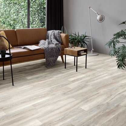 Kompact KlickFloor - Huckleberry Grey Oak vinyl living room flooring with couch and coffee table 82201