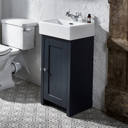 Tavistock Lansdown Cloakroom 430mm Freestanding Unit &amp; Basin - Various Colours unit against stoned white wall with a toilet on the left side LAN400C.MB